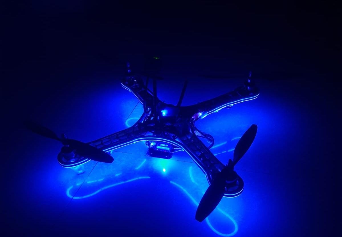 CruiseHead team performing agriculture spraying services by drone