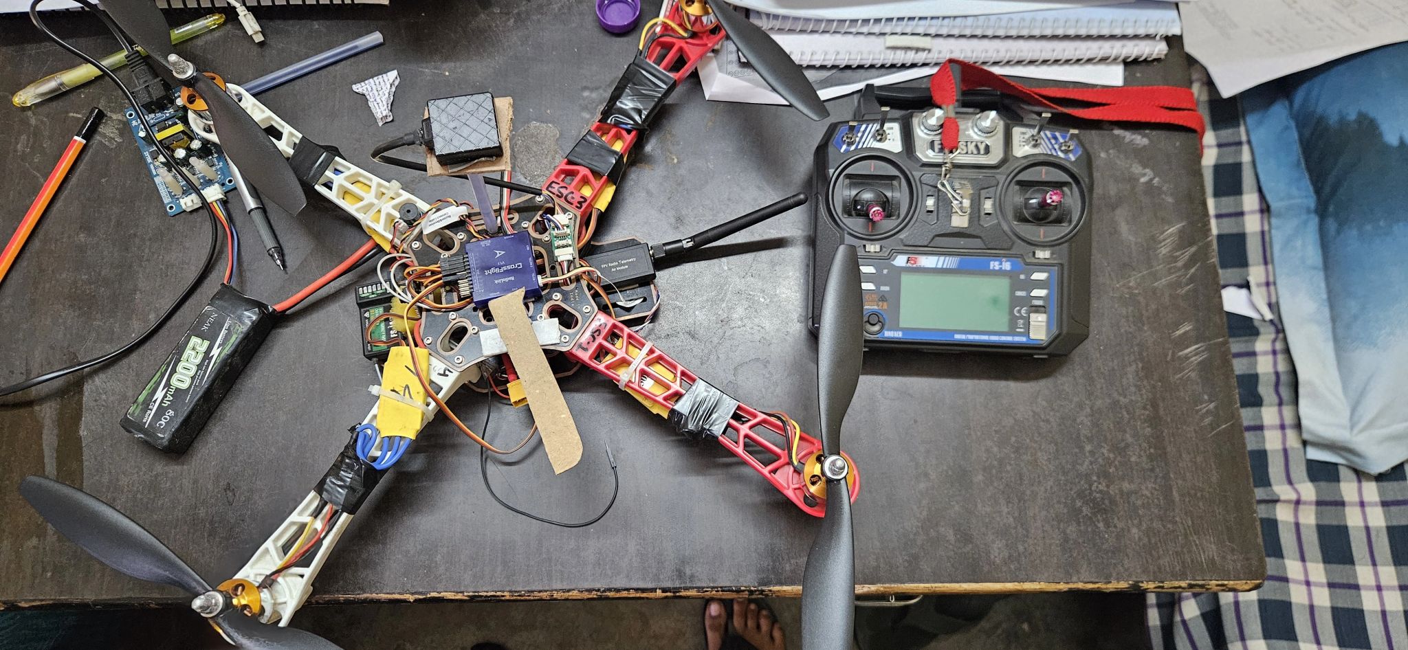 Technician repairing and maintaining a drone