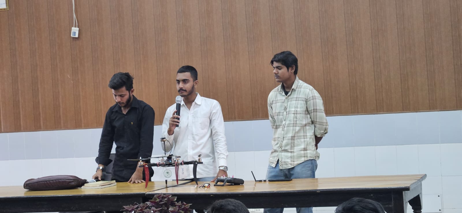 RMPS AMU workshop session with drone on table and students watching